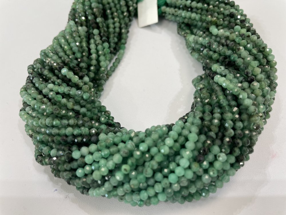 Shaded Green Emerald Rounds Faceted