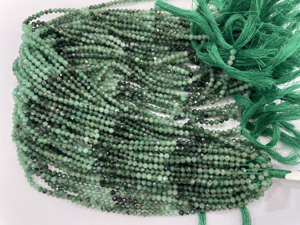 Shaded Green Emerald Rounds Faceted